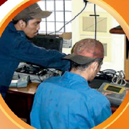 Technicians working with instruments and test equipment